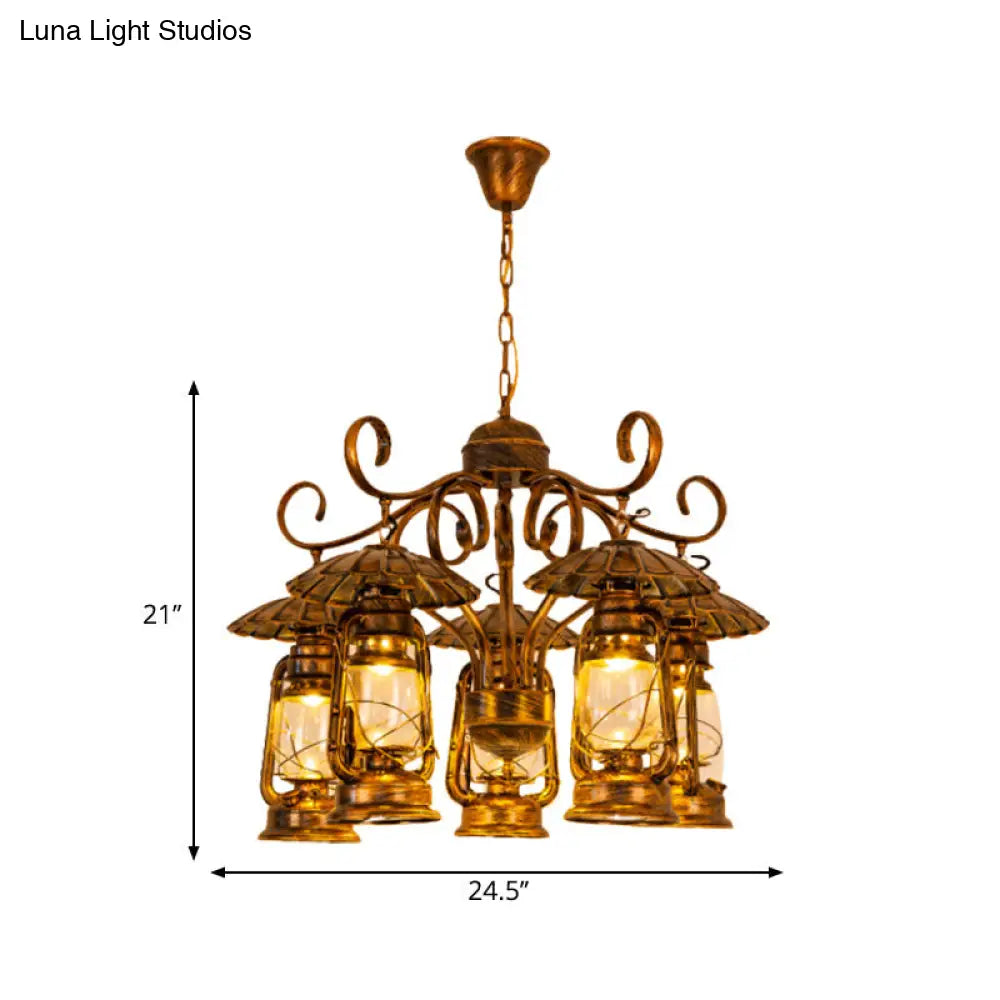 Village Style Metal And Clear Glass 5-Light Aged Brass Lantern Chandelier