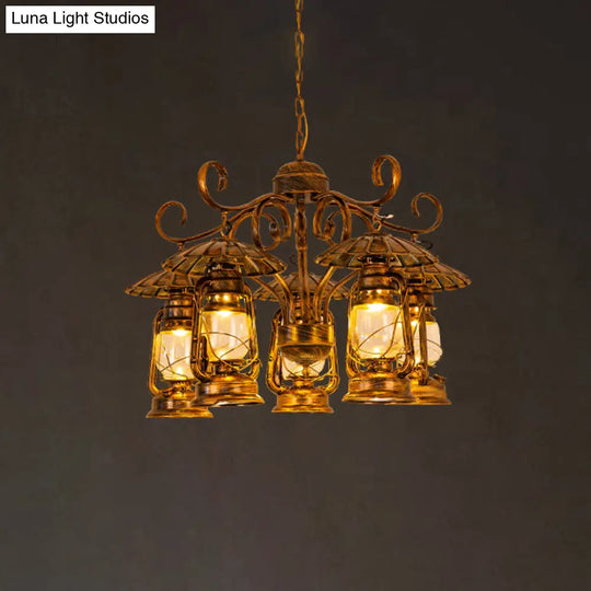 Village Style Metal And Clear Glass 5-Light Aged Brass Lantern Chandelier