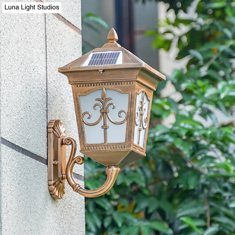 Vintage Courtyard Solar Wall Light - House Shaped Metal Lamp With Frost Glass Shade