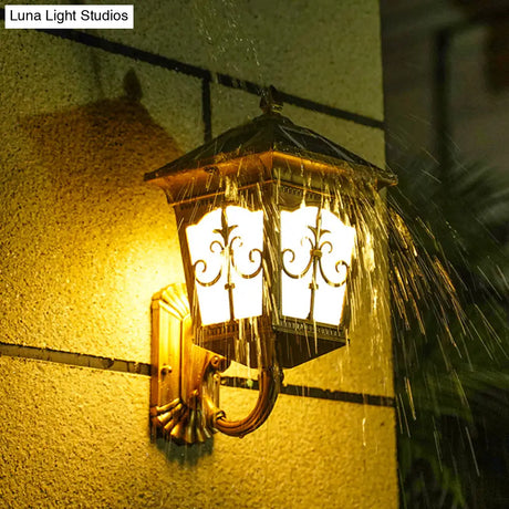 Vintage Courtyard Solar Wall Light - House Shaped Metal Lamp With Frost Glass Shade