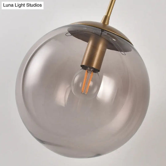 Vintage Glass Sphere Wall Sconce - Clear/Smoke Grey 1 Light Retro Lamp With Gold/Black Arm