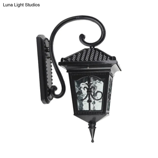 Vintage Pavilion 1-Light Sconce In Black/Bronze With Curvy Arm And Clear Water Glass