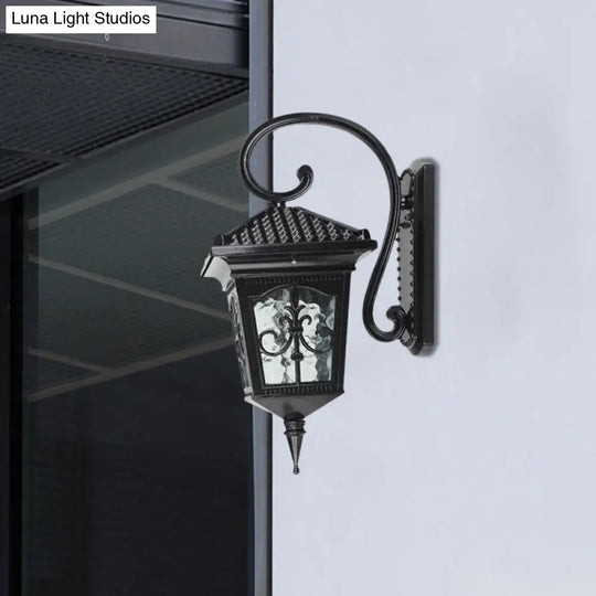 Vintage Pavilion 1-Light Sconce In Black/Bronze With Curvy Arm And Clear Water Glass