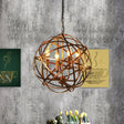Vintage Style 4-Head Ceiling Chandelier With Iron Globe Cage Shade In Antique Brass For Dining Room