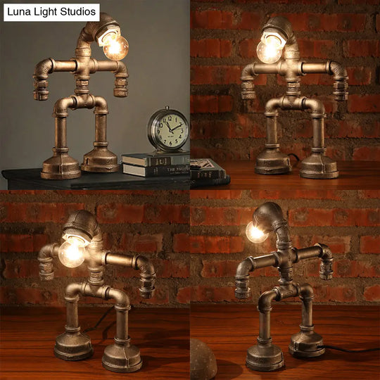 Vintage Stylish Sitting Robot Wrought Iron Table Lamp With Antique Brass Plumbing Pipe