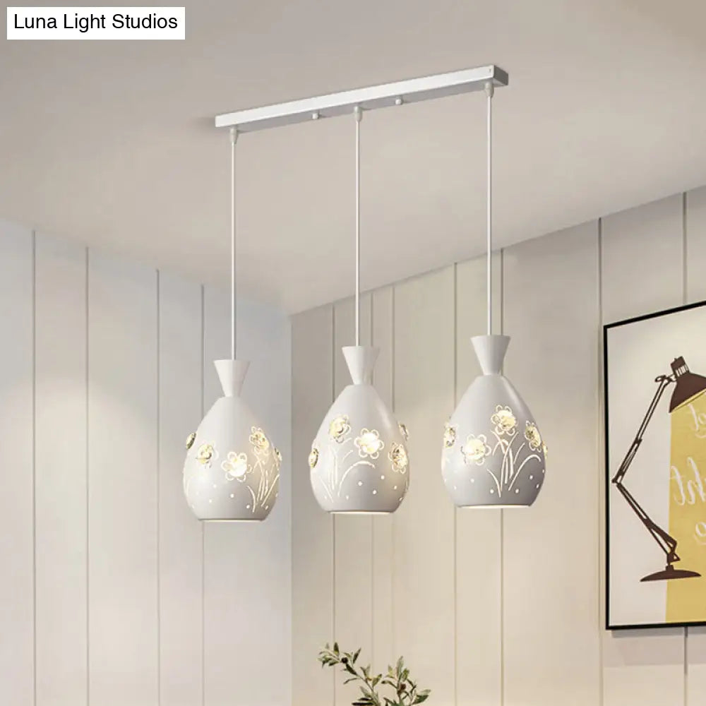 Modern White Cone Pendant Light With Laser-Cut Floral Design 3-Light Iron Hanging Lamp