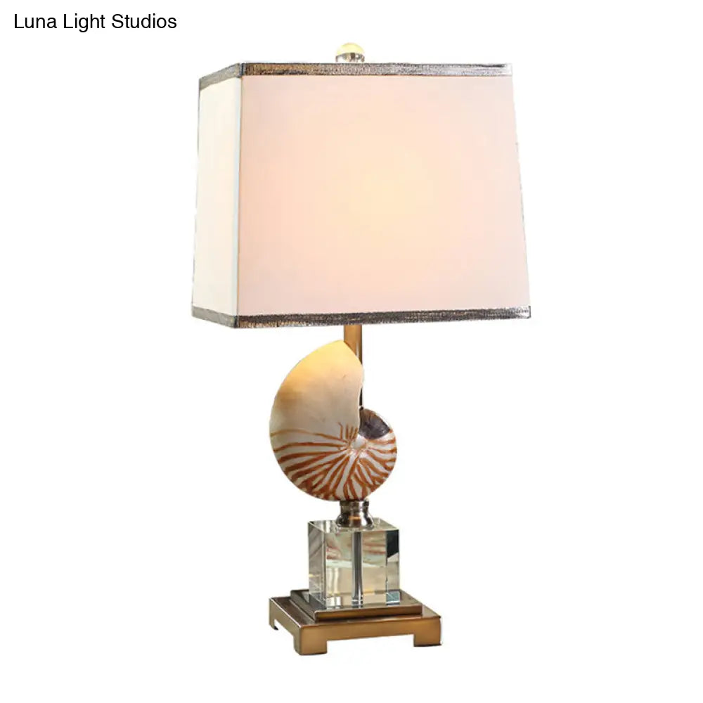 White Fabric Cuboid Nightstand Lamp With Decorative Nautilus Shell Accent - 1 Head Night Table Light