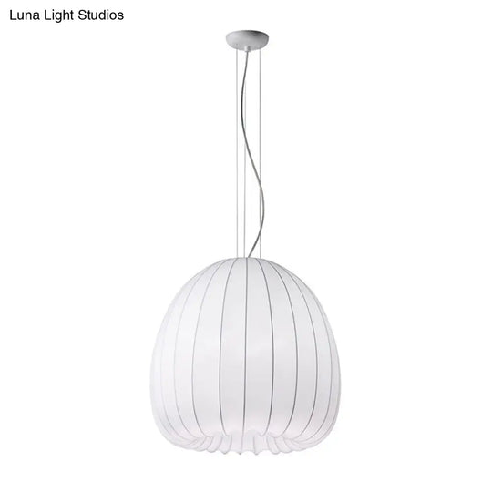 White Fabric Hemisphere Pendant Light Over Table