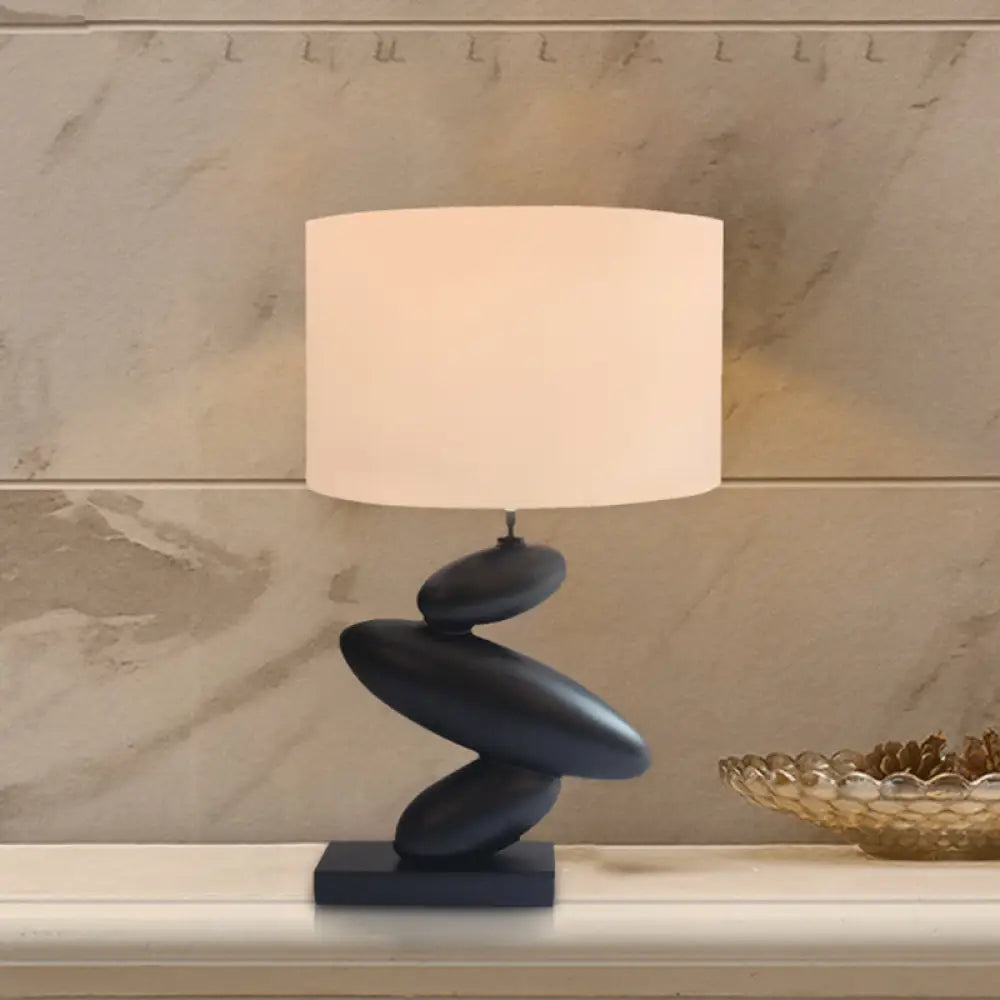 White Fabric Table Lamp With Black Cobble Base - Straight Sided Shade Night