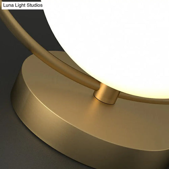 White Glass Ball Bedside Lamp With Gold Ring Decor - Single Minimalistic Table Light