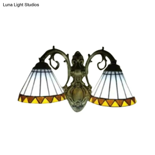 White Glass Cone Wall Sconce With Curved Arm - 2-Light Tiffany Lighting In Brass