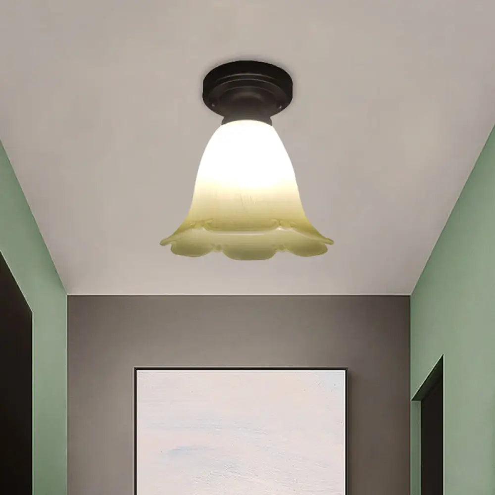 White Glass Flush Mount Ceiling Light With Black Base And Cottage Flower Design