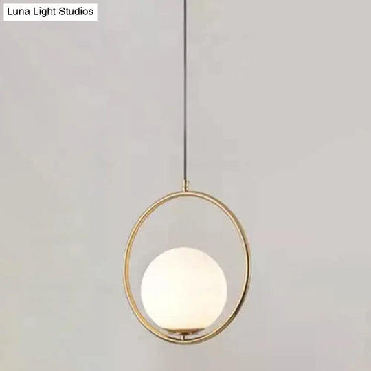 White Glass Pendant Light With Mid-Century Globe Design And Metal Ring