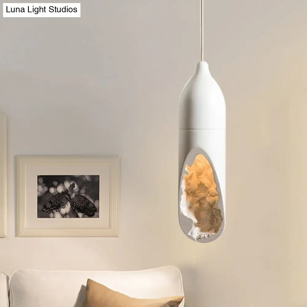 Resin Farmhouse Pendant Light With Hollow-Out Design In White - Pill-Shaped Ceiling Lamp For Dining