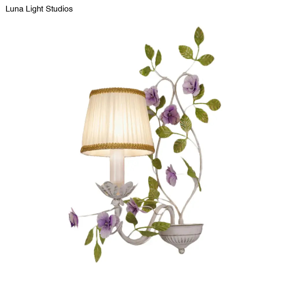 White Wall Sconce With Purple Flower Design And Pleated Shade For Bedroom Decor