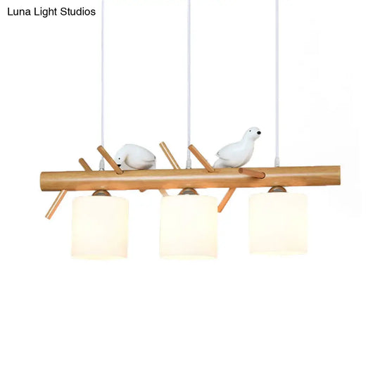 Wooden Hanging Chandelier With 2/3 Lights Glass Cylinder Shade And Bird Décor - Ideal For Dining