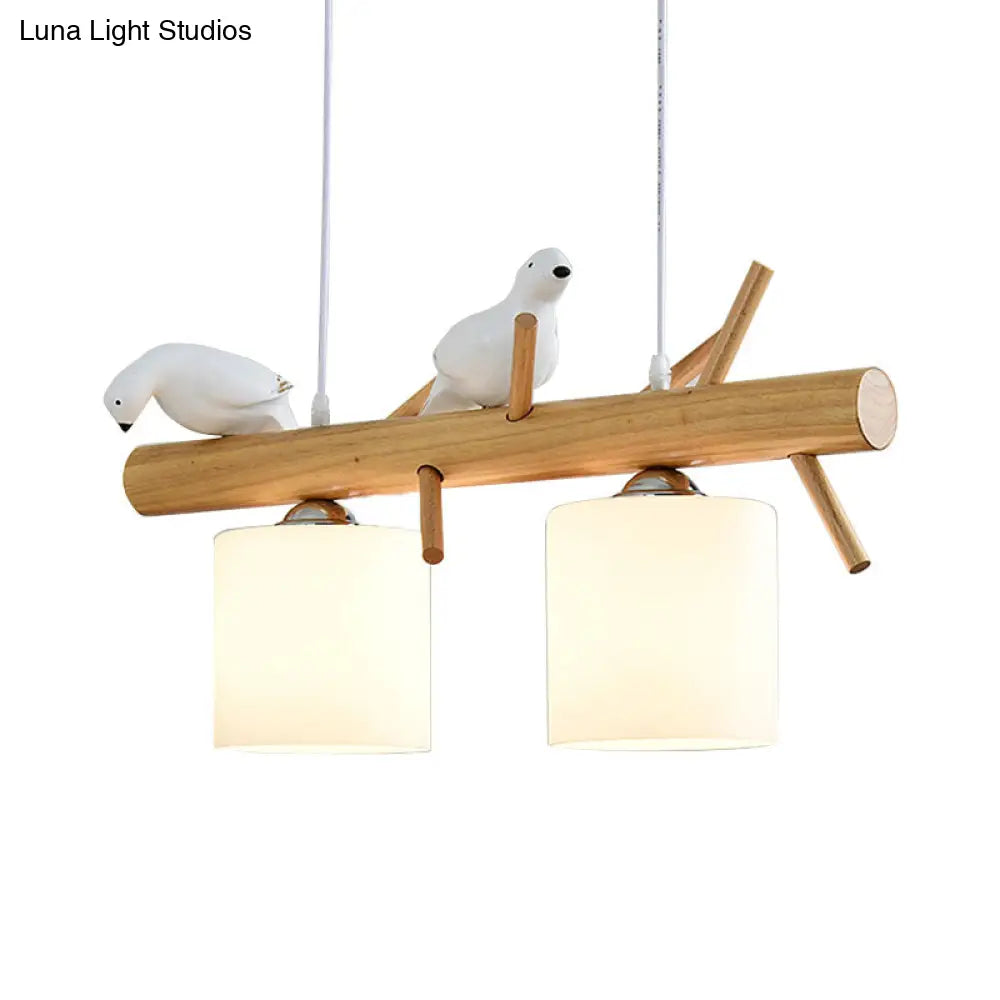 Wooden Hanging Chandelier With 2/3 Lights Glass Cylinder Shade And Bird Décor - Ideal For Dining