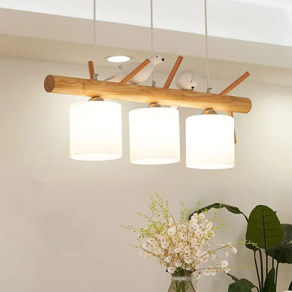 Wooden Hanging Chandelier With 2/3 Lights Glass Cylinder Shade And Bird Décor - Ideal For Dining